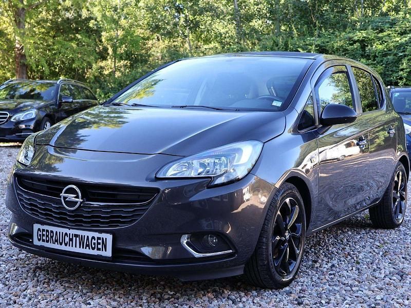 Grau metallic Gebraucht 2015 Opel Corsa Color Edition Kleinwagen | 6.179 € (Fairer Preis) - Bild 1/4