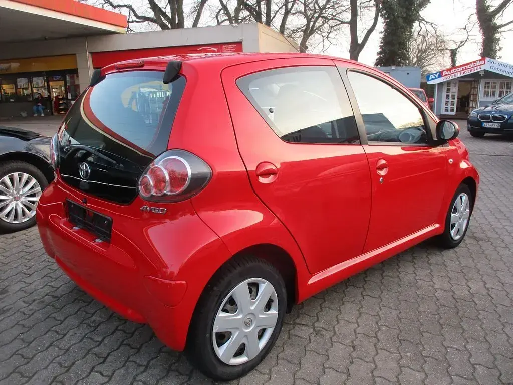 Gebraucht Toyota Aygo Cool 68 PS (50 kW) 2009 Rot Kleinwagen