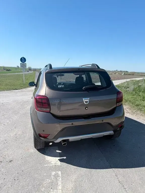 Gebraucht Dacia Sandero Celebration 90 PS (66 kW) 2018 Braun Limousine