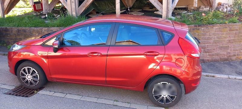 Orange Gebraucht 2010 Ford Fiesta Ambiente Kleinwagen | 2.600 € (Superpreis) - Bild 1/4