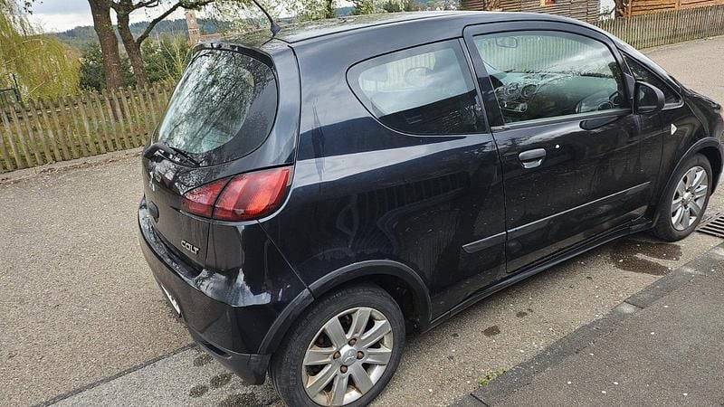 Second-hand Mitsubishi Colt 75 CP (55 kW) 2011 Negru Hatchback