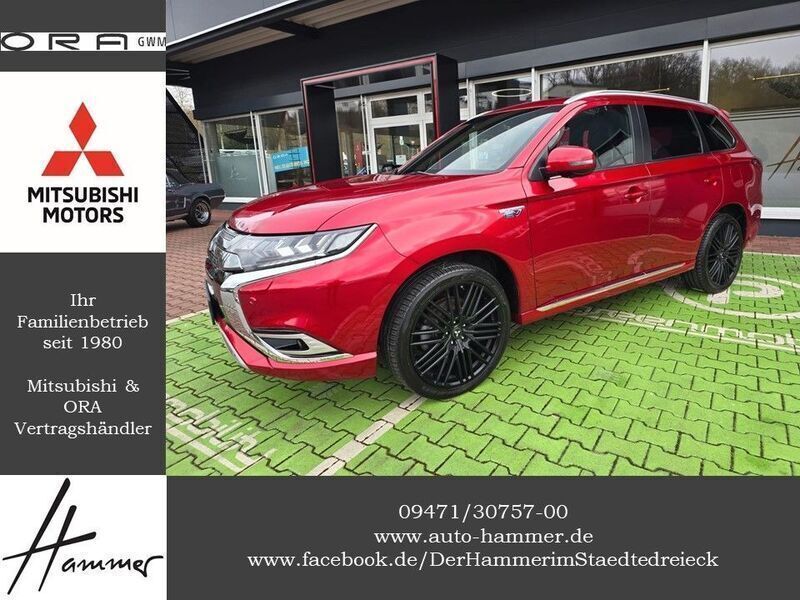 Rot Gebraucht 2021 Mitsubishi Outlander P-HEV Top SUV | 26.980 € (Etwas zu teuer) - Bild 1/4