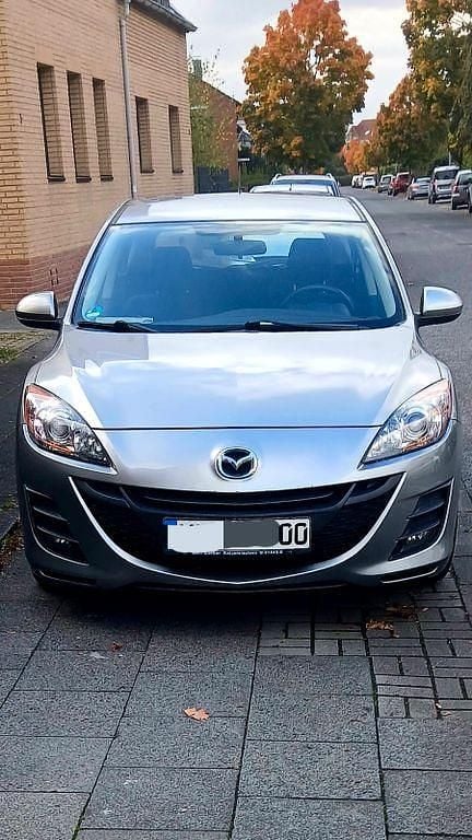 Grau Gebraucht 2010 Mazda 3 Active Limousine | 5.401 € (Superpreis) - Bild 1/4