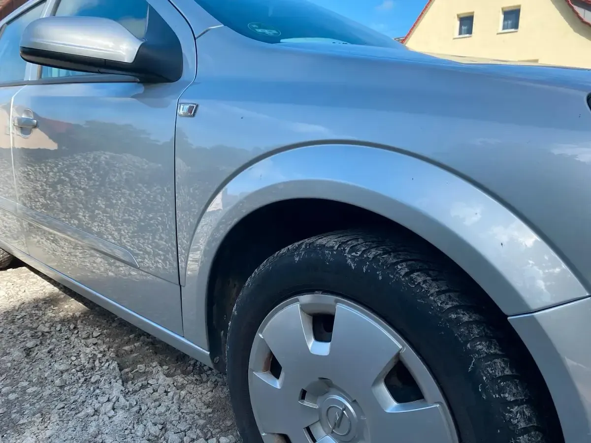 Używany Opel Astra 105 KM (77 kW) 2005 Srebrny Kombi