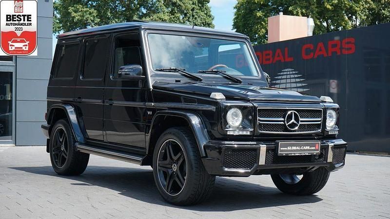 Obsidianschwarz (metallic) Gebraucht 2009 Mercedes G500 AMG SUV | 49.885 € - Bild 1/4