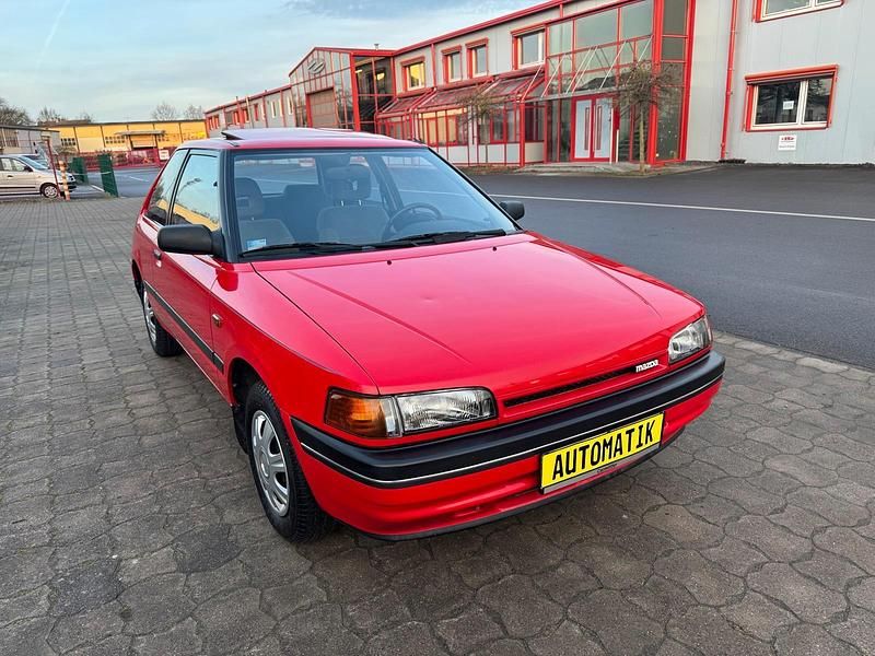 Gebraucht Mazda 323 84 PS (61 kW) 1991 Rot Limousine