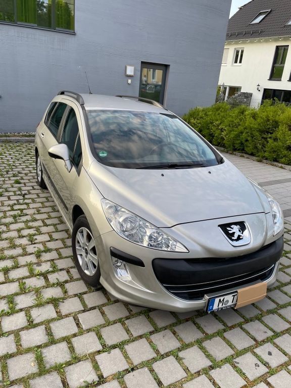 Grau Gebraucht 2009 Peugeot 308 Business-Line Kombi | 3.498 € - Bild 1/4