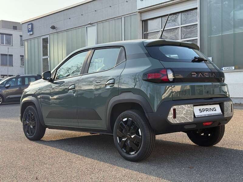Gebraucht Dacia Spring Extreme 47 kW (65 PS) 2024 Oliv grün Kleinwagen