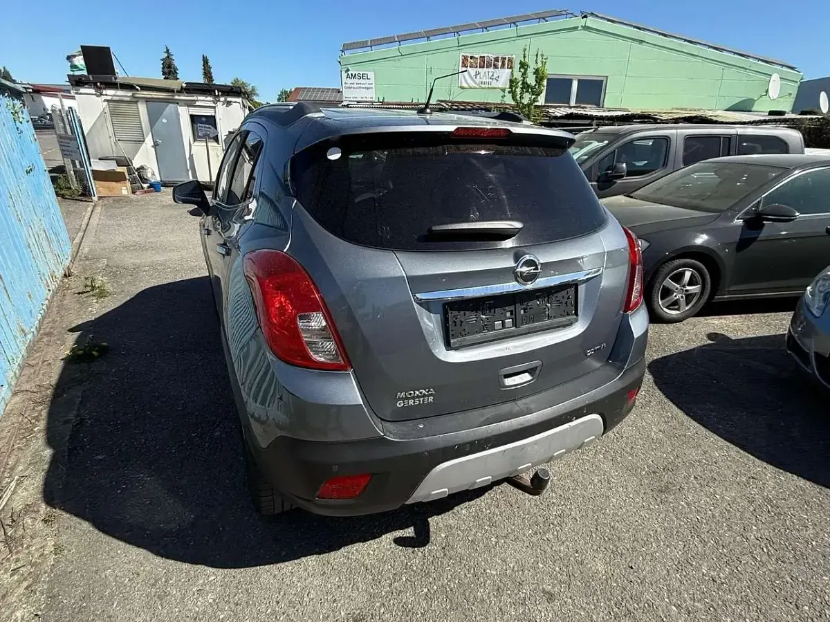 Gebraucht Opel Mokka Innovation 131 PS (96 kW) 2014 Seidengrau/lichtgrau/irongrey SUV