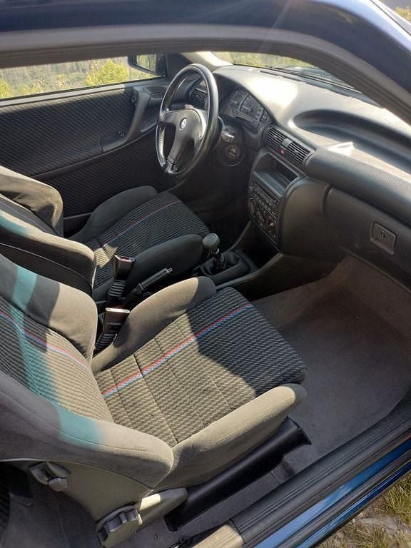 Gebraucht Opel Astra 150 PS (110 kW) 1993 Blau Limousine