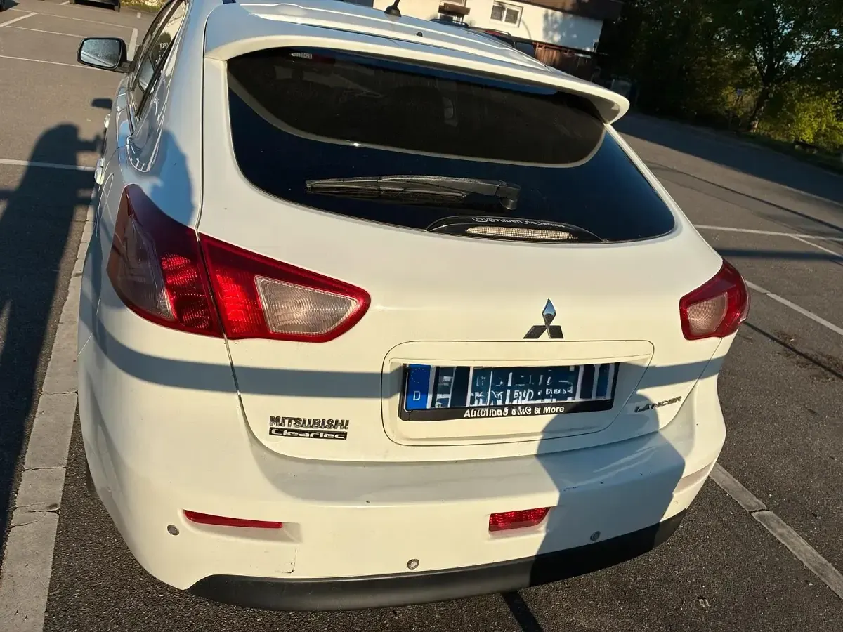 Gebraucht Mitsubishi Lancer 116 PS (85 kW) 2010 Weiß Limousine