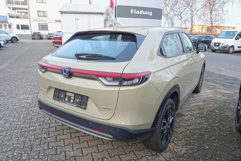 Gebraucht Honda HR-V Elegance 107 PS (78 kW) 2023 Sand khaki p. (metallic) SUV