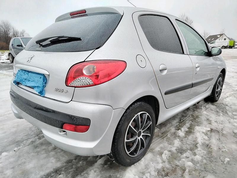 Gebraucht Peugeot 206+ 74 PS (54 kW) 2012 Grau Kleinwagen