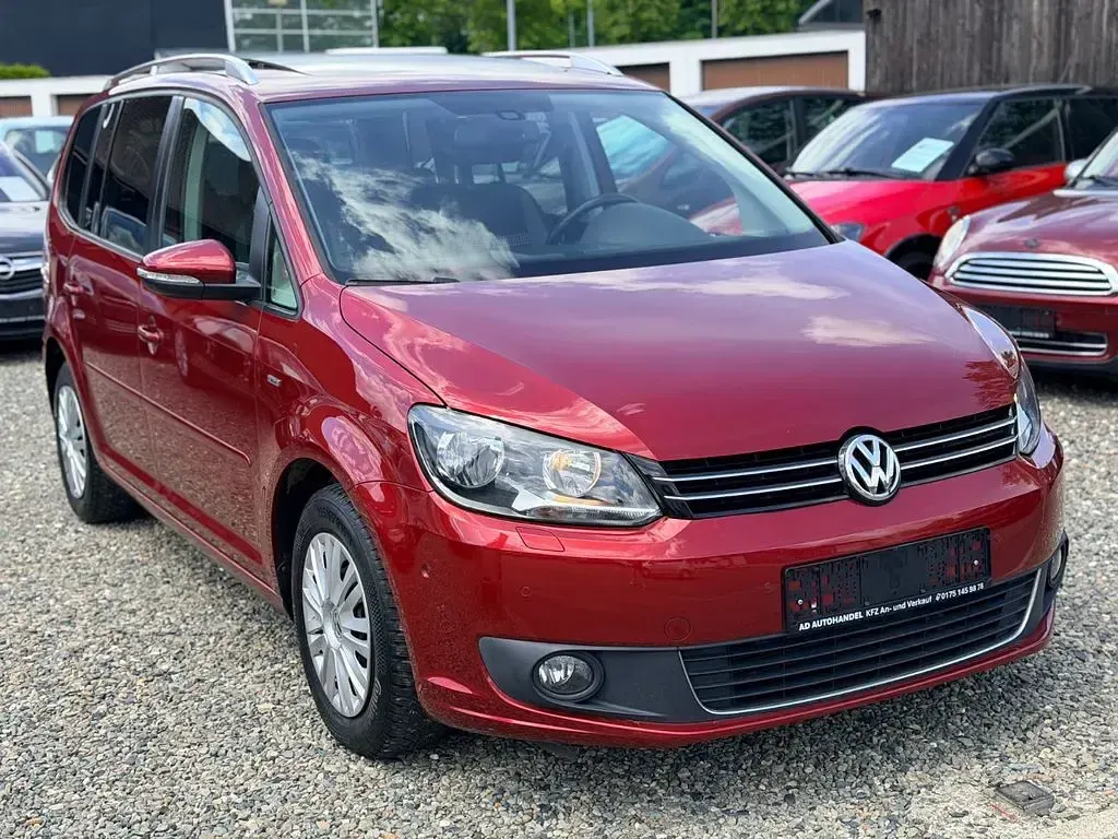 Gebraucht VW Touran Life 105 PS (77 kW) 2013 Rot Van / Kleinbus