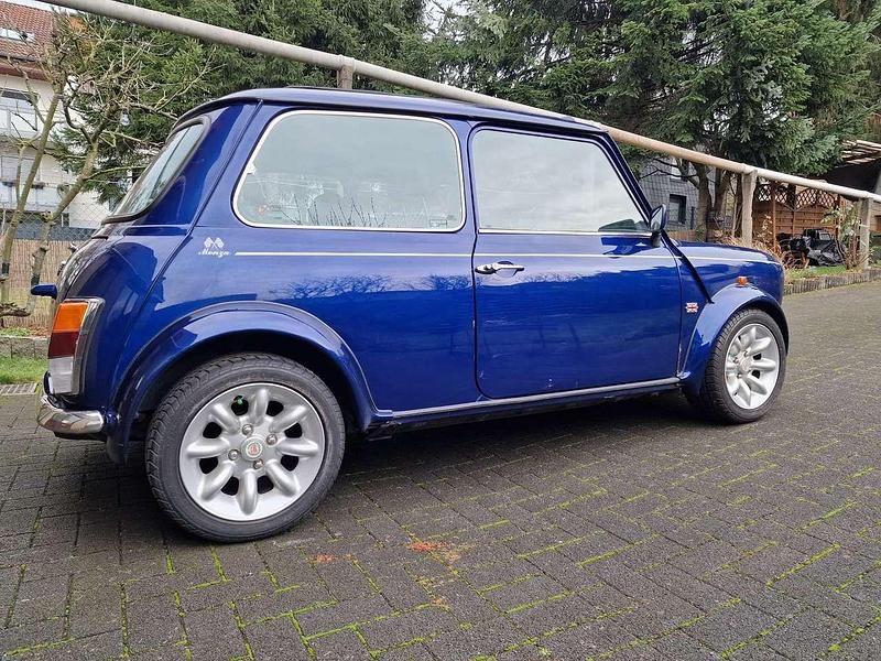 Gebraucht Rover Mini 63 PS (46 kW) 1998 Tahiti blue Limousine