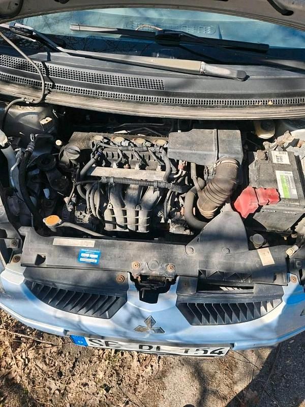 Second-hand Mitsubishi Colt 109 CP (80 kW) 2004 Argintiu Hatchback