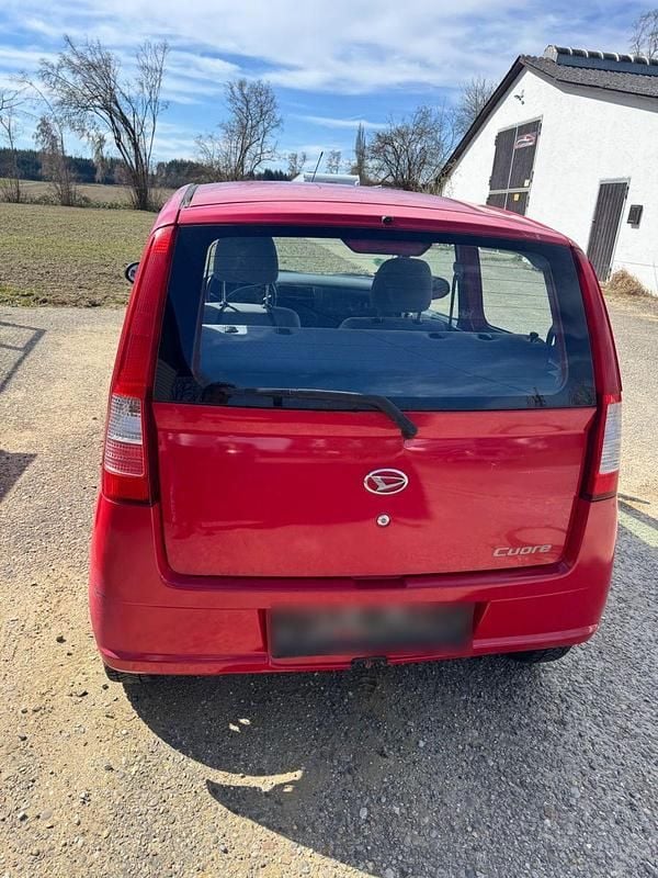Gebraucht Daihatsu Cuore 58 PS (42 kW) 2003 Rot Kleinwagen