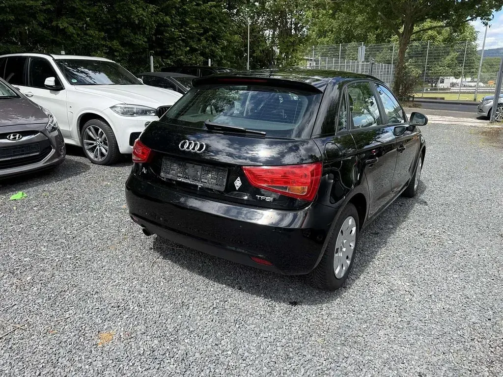 Gebraucht Audi A1 Attraction 86 PS (63 kW) 2013 Brillantschwarz Kleinwagen
