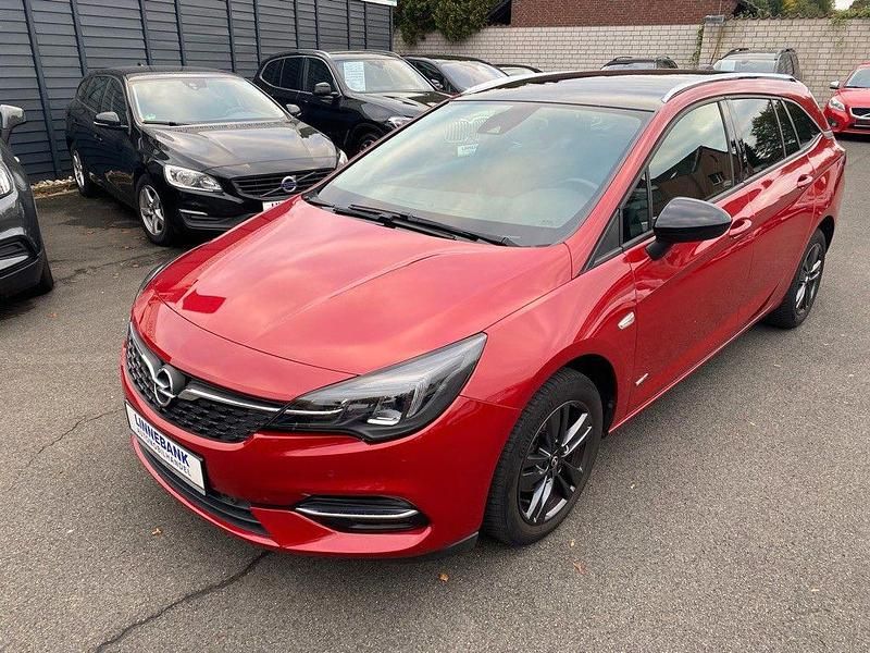 Peperoncino red Gebraucht 2021 Opel Astra Design & Tech Kombi | 14.990 € (Fairer Preis) - Bild 1/4