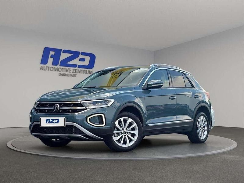 Petroleum blue metallic Gebraucht 2024 VW T-Roc Style SUV | 29.988 € (Guter Preis) - Bild 1/4