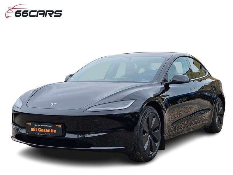 Schwarz Gebraucht 2023 Tesla Model 3 Long Range Limousine | 38.480 € - Bild 1/4