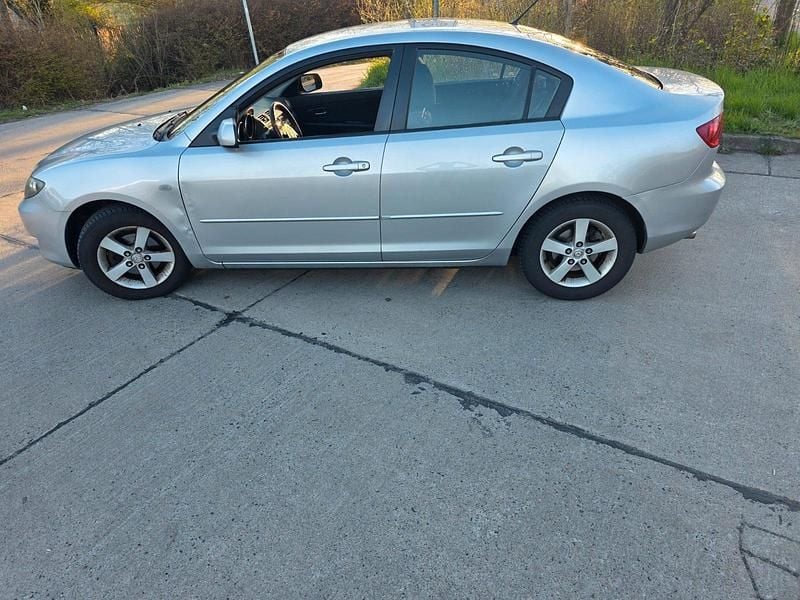 Second-hand Mazda 3 105 CP (77 kW) 2004 Argintiu Berlinǎ