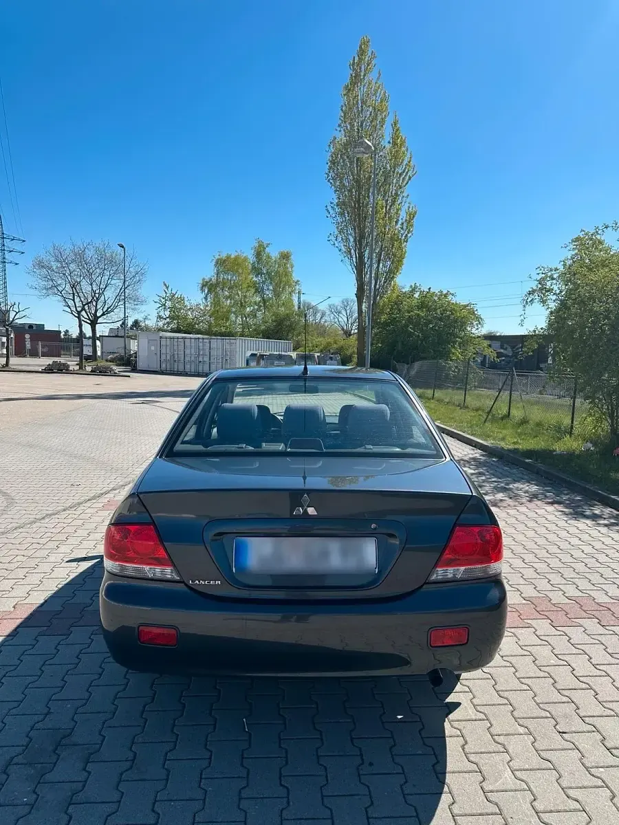 Second-hand Mitsubishi Lancer 98 CP (72 kW) 2004 Gri Berlinǎ