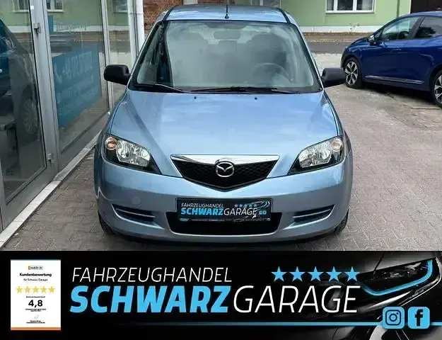 Używany Mazda 2 Comfort 202 KM (148 kW) 2004 Niebieski Hatchback