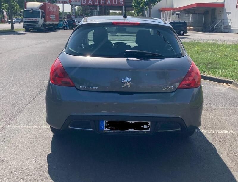Grau Gebraucht 2010 Peugeot 308 Limousine | 4.350 € (Fairer Preis) - Bild 1/4
