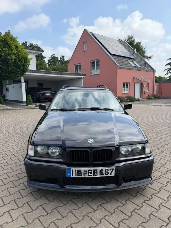 Gebraucht BMW 318 M Sport 140 PS (102 kW) 1997 Schwarz Kombi