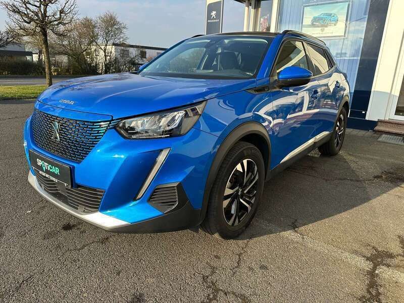 Vertigo blau metallic Gebraucht 2021 Peugeot e-2008 Allure SUV | 18.990 € (Fairer Preis) - Bild 1/4