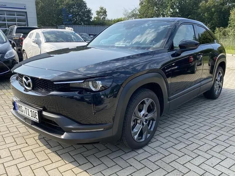 Jet black (metallic) Gebraucht 2021 Mazda MX30 Comfort SUV | 15.980 € (Etwas zu teuer) - Bild 1/4