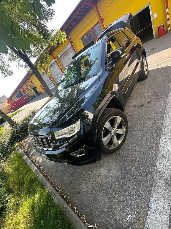 Schwarz Gebraucht 2016 Jeep Grand Cherokee Overland SUV | 11.999 € (Superpreis) - Bild 1/4