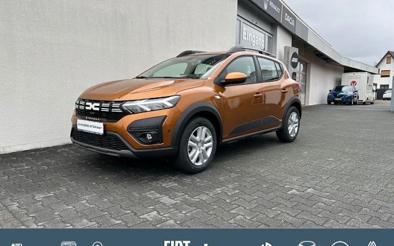 Orange Gebraucht 2023 Dacia Sandero Expression Kleinwagen | 16.490 € (Fairer Preis) - Bild 1/4