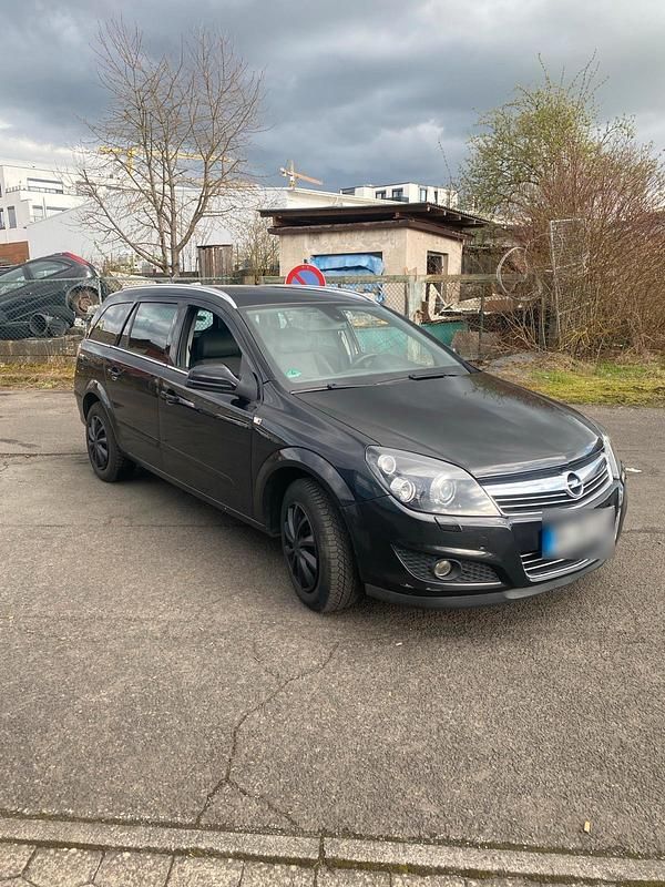 Gebraucht Opel Astra 116 PS (85 kW) 2010 Schwarz Kombi