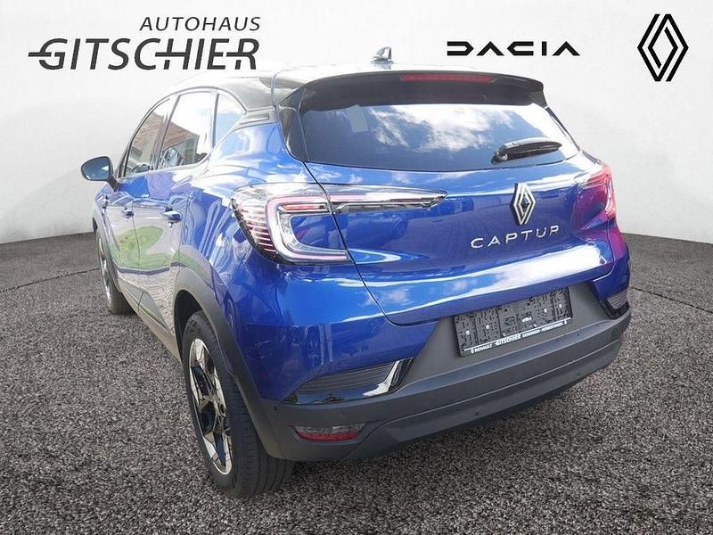 Neu Renault Captur Techno 101 PS (74 kW) 2025 Ironblau metallic, black pear SUV