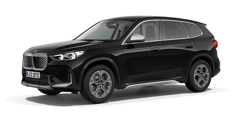 Schwarz Gebraucht 2024 BMW iX1 Luxury Line SUV | 42.613 € (Etwas zu teuer) - Bild 1/4