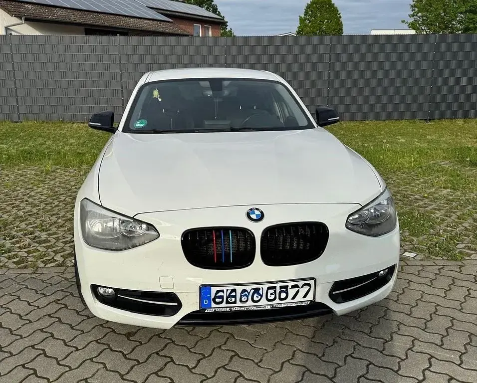 Używany BMW 118 Performance 170 KM (125 kW) 2012 Biały Hatchback