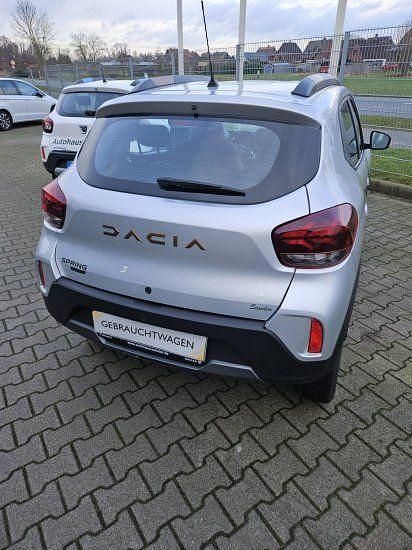 Gebraucht Dacia Spring Extreme 47 kW (65 PS) 2023 Diamantsilbergrau Kleinwagen