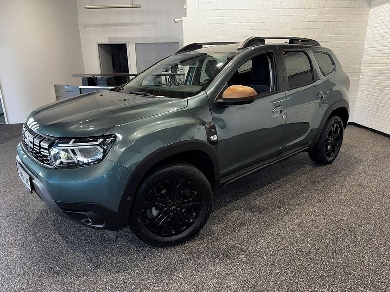 Grün Gebraucht 2023 Dacia Duster Extreme SUV | 22.990 € (Fairer Preis) - Bild 1/4