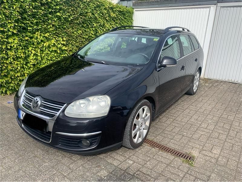 Second-hand VW Golf V 140 CP (102 kW) 2008 Negru Break
