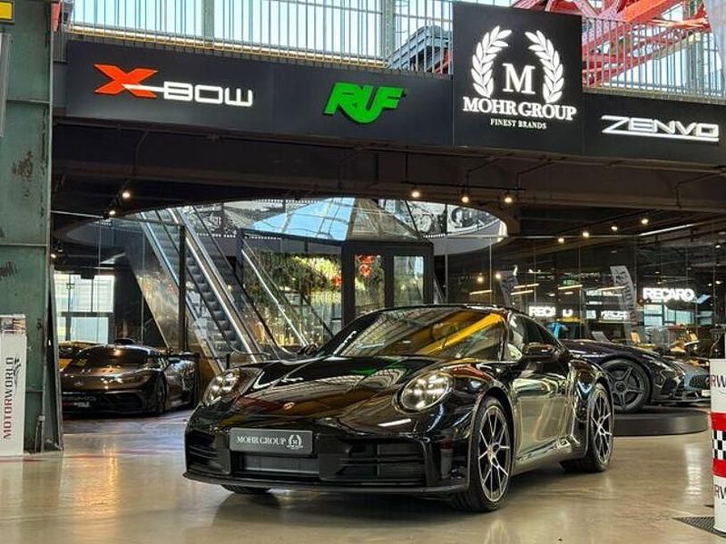 Tiefschwarzmetallic Gebraucht 2025 Porsche 911 Carrera Sport Coupé | 137.400 € - Bild 1/4