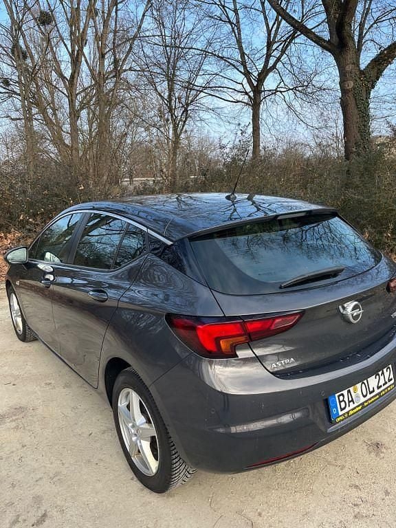 Używany Opel Astra Edition 125 KM (91 kW) 2016 Brązowy Sedan/Limuzyna