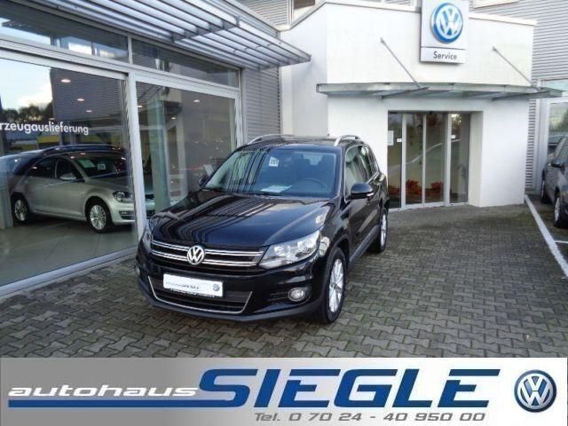 Schwarz metallic Gebraucht 2014 VW Tiguan Sport SUV | 17.490 € (Teuer) - Bild 1/4
