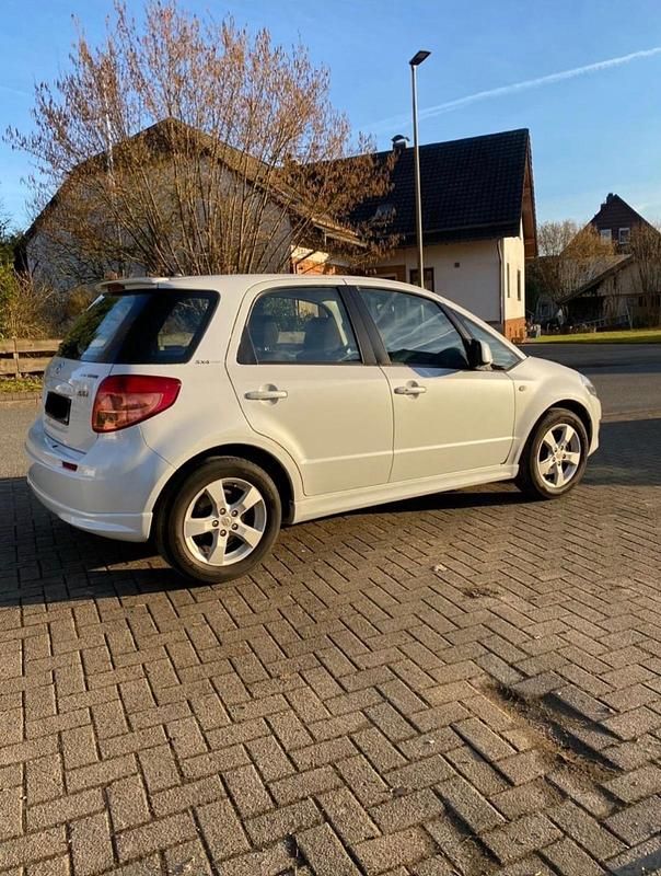 Gebraucht Suzuki SX4 120 PS (88 kW) 2010 Weiß Limousine
