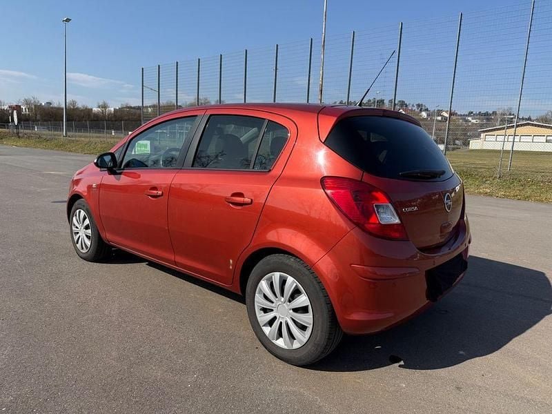 Gebraucht Opel Corsa Active 87 PS (63 kW) 2013 Rot Kleinwagen