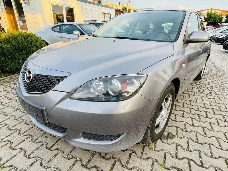 Grau Gebraucht 2004 Mazda 3 Comfort Kleinwagen | 2.490 € (Fairer Preis) - Bild 1/4