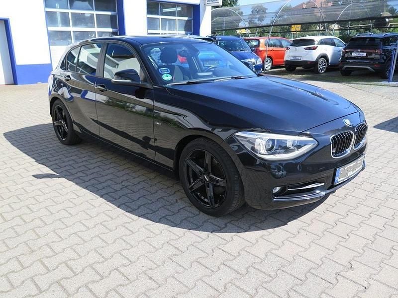Schwarz Gebraucht 2011 BMW 118 Sport Line Kleinwagen | 6.999 € (Superpreis) - Bild 1/4
