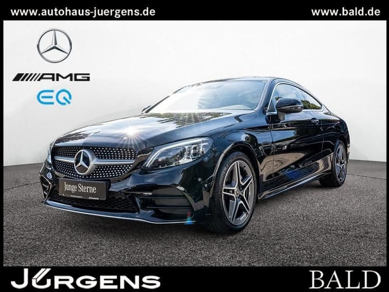 Schwarz metalliclack obsidians Gebraucht 2022 Mercedes C220 AMG Coupé | 35.780 € (Superpreis) - Bild 1/4
