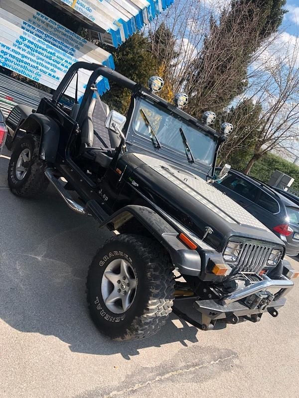 Schwarz Gebraucht 1993 Jeep Wrangler SUV | 15.499 € - Bild 1/4